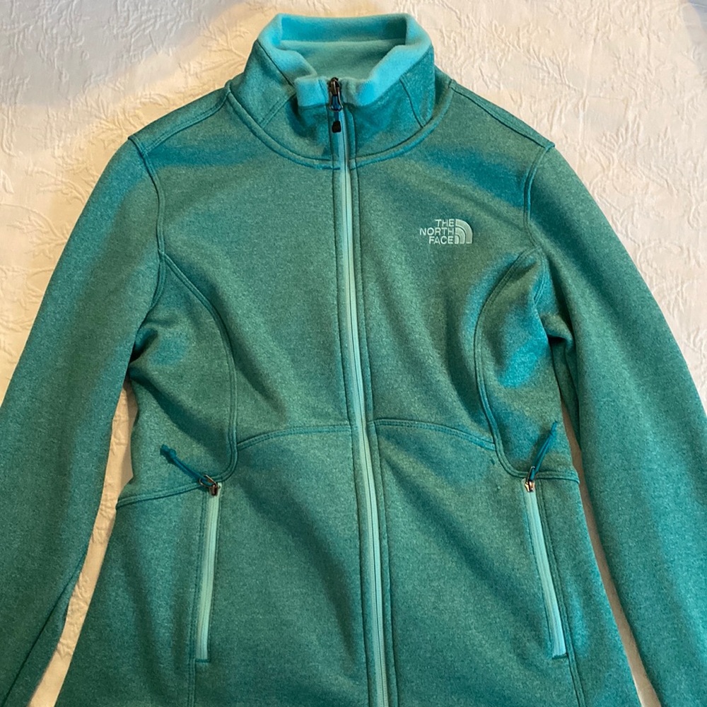 Womens North Face Fleece Zipper Jacket. Blue/green color. Great new condition.